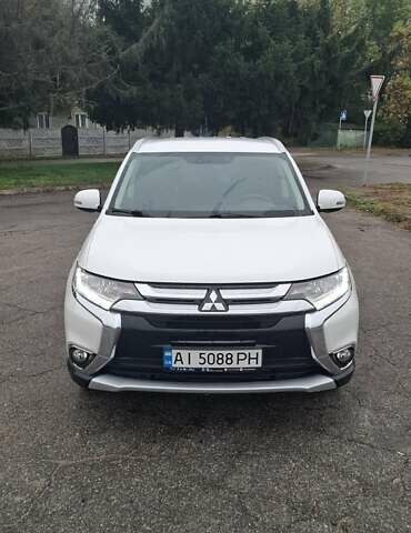 Білий Міцубісі Аутлендер, об'ємом двигуна 2.3 л та пробігом 158 тис. км за 18200 $, фото 5 на Automoto.ua