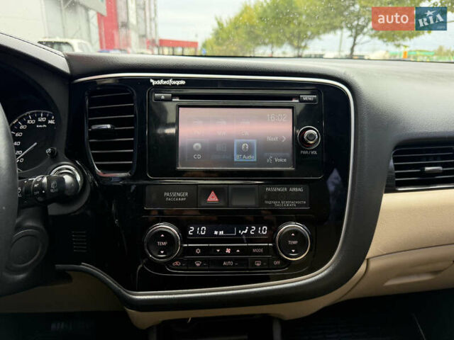 Белый Мицубиси Аутлендер, объемом двигателя 2.4 л и пробегом 160 тыс. км за 16500 $, фото 39 на Automoto.ua