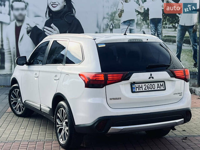 Белый Мицубиси Аутлендер, объемом двигателя 2.4 л и пробегом 147 тыс. км за 12999 $, фото 18 на Automoto.ua