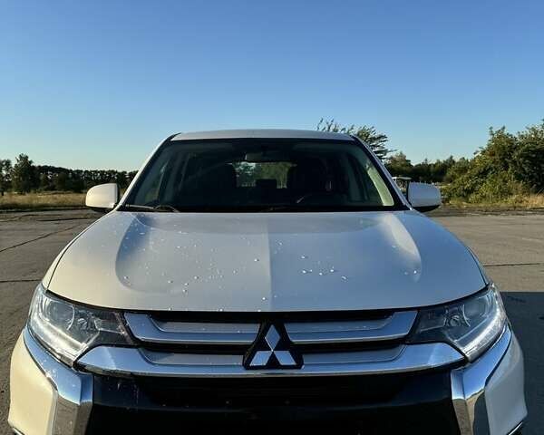 Білий Міцубісі Аутлендер, об'ємом двигуна 2.4 л та пробігом 91 тис. км за 15900 $, фото 20 на Automoto.ua