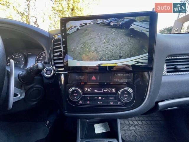 Белый Мицубиси Аутлендер, объемом двигателя 2 л и пробегом 146 тыс. км за 14500 $, фото 24 на Automoto.ua