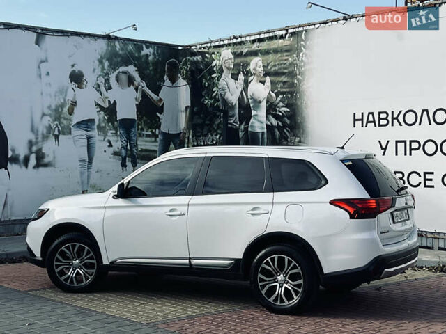 Белый Мицубиси Аутлендер, объемом двигателя 2.4 л и пробегом 147 тыс. км за 12999 $, фото 19 на Automoto.ua