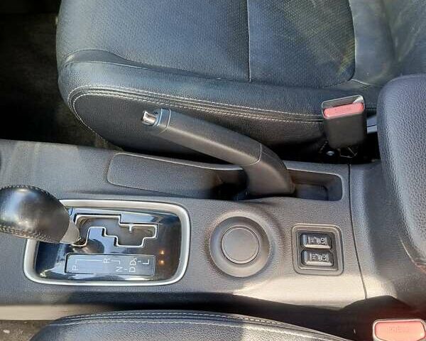 Белый Мицубиси Аутлендер, объемом двигателя 2.36 л и пробегом 142 тыс. км за 15100 $, фото 9 на Automoto.ua