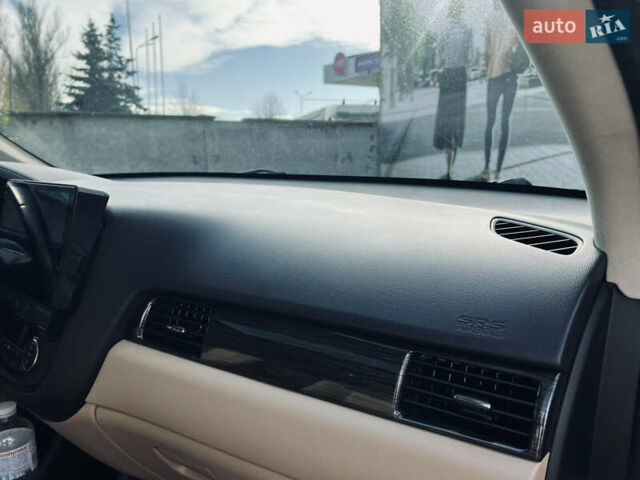 Белый Мицубиси Аутлендер, объемом двигателя 2.4 л и пробегом 147 тыс. км за 12999 $, фото 36 на Automoto.ua