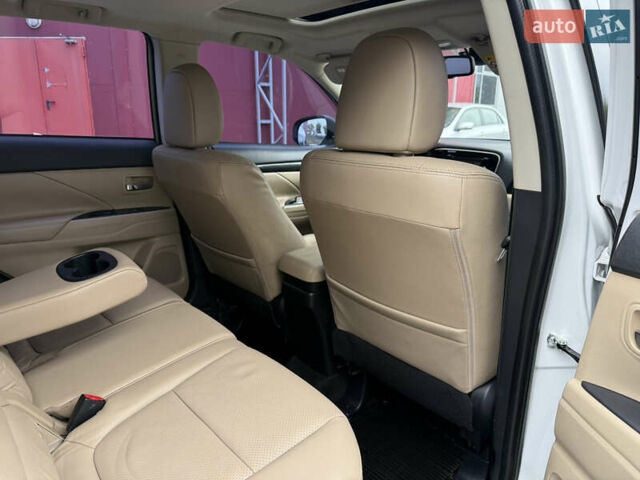 Белый Мицубиси Аутлендер, объемом двигателя 2.4 л и пробегом 159 тыс. км за 16700 $, фото 21 на Automoto.ua