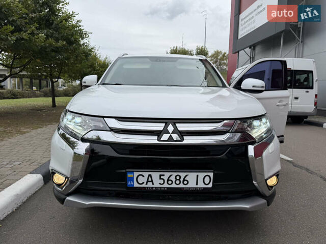 Мицубиси Аутлендер 2015 в Киеве на Automoto.ua Белый Мицубиси Аутлендер, объемом двигателя 2.4 л и пробегом 159 тыс. км за 17300 $, фото 26 на Automoto.ua