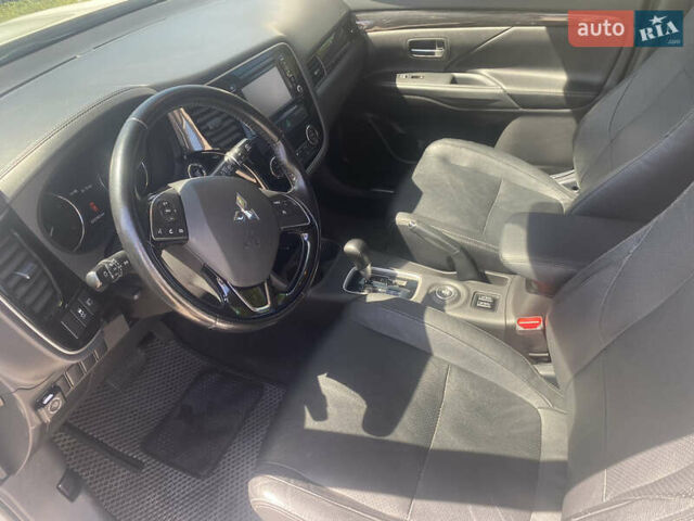 Білий Міцубісі Аутлендер, об'ємом двигуна 2.36 л та пробігом 159 тис. км за 15500 $, фото 10 на Automoto.ua