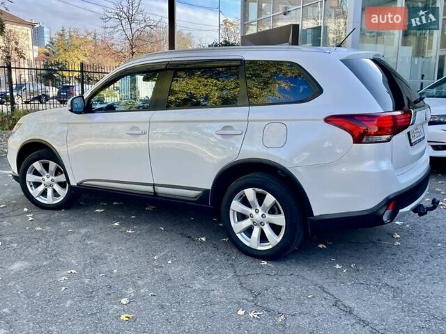 Белый Мицубиси Аутлендер, объемом двигателя 2 л и пробегом 146 тыс. км за 14500 $, фото 13 на Automoto.ua