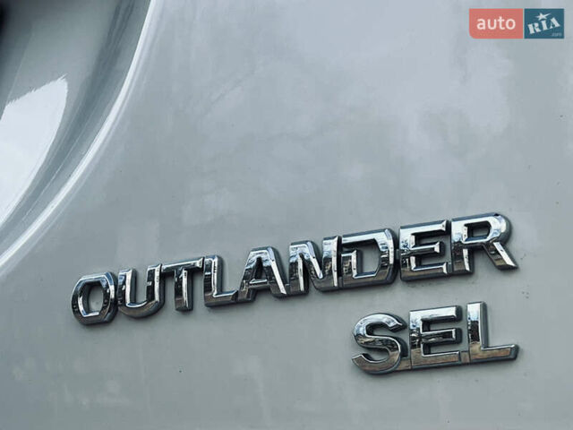 Белый Мицубиси Аутлендер, объемом двигателя 2.4 л и пробегом 147 тыс. км за 12999 $, фото 29 на Automoto.ua