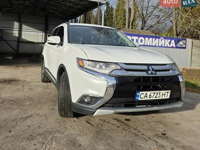 Белый Мицубиси Аутлендер, объемом двигателя 2.36 л и пробегом 169 тыс. км за 13300 $, фото 8 на Automoto.ua