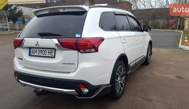 Белый Мицубиси Аутлендер, объемом двигателя 2.4 л и пробегом 240 тыс. км за 14900 $, фото 9 на Automoto.ua