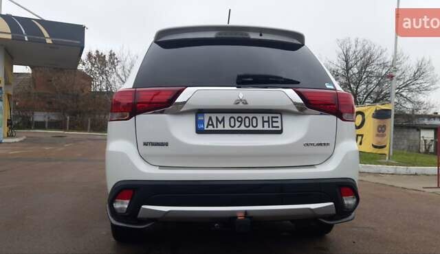 Белый Мицубиси Аутлендер, объемом двигателя 2.4 л и пробегом 240 тыс. км за 14900 $, фото 11 на Automoto.ua