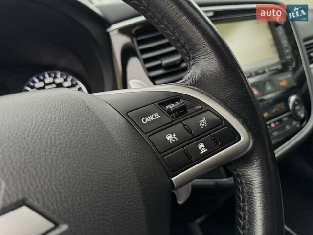 Белый Мицубиси Аутлендер, объемом двигателя 2.2 л и пробегом 140 тыс. км за 16200 $, фото 46 на Automoto.ua