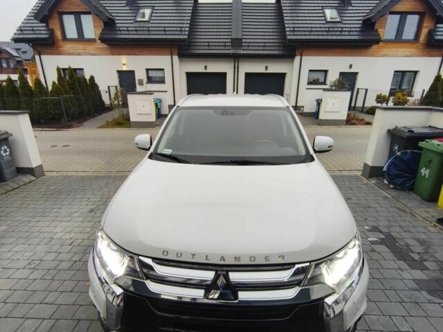 Белый Мицубиси Аутлендер, объемом двигателя 2 л и пробегом 135 тыс. км за 10200 $, фото 7 на Automoto.ua