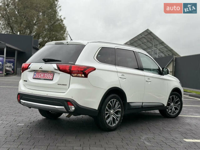 Мицубиси Аутлендер 2016 в Самборе на Automoto.ua Белый Мицубиси Аутлендер, объемом двигателя 2.23 л и пробегом 215 тыс. км за 17500 $, фото 27 на Automoto.ua