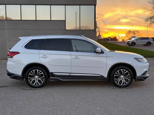 Белый Мицубиси Аутлендер, объемом двигателя 3 л и пробегом 78 тыс. км за 9900 $, фото 7 на Automoto.ua