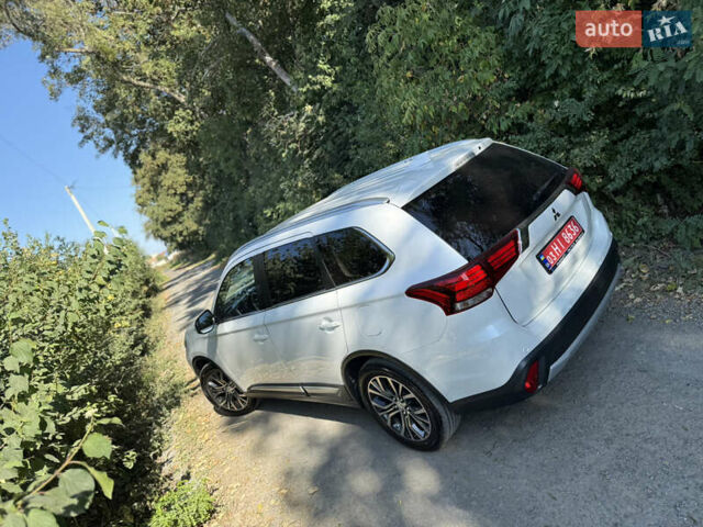 Белый Мицубиси Аутлендер, объемом двигателя 2.2 л и пробегом 240 тыс. км за 17999 $, фото 50 на Automoto.ua