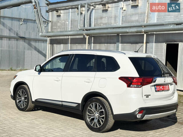 Білий Міцубісі Аутлендер, об'ємом двигуна 2.4 л та пробігом 178 тис. км за 12750 $, фото 6 на Automoto.ua