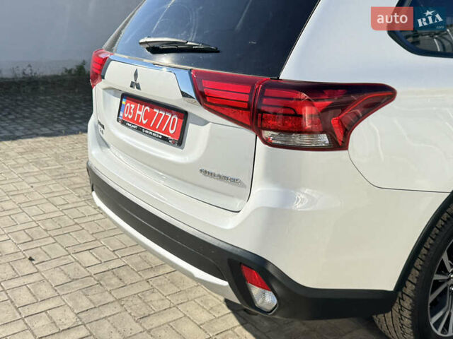 Білий Міцубісі Аутлендер, об'ємом двигуна 2.4 л та пробігом 178 тис. км за 12750 $, фото 30 на Automoto.ua