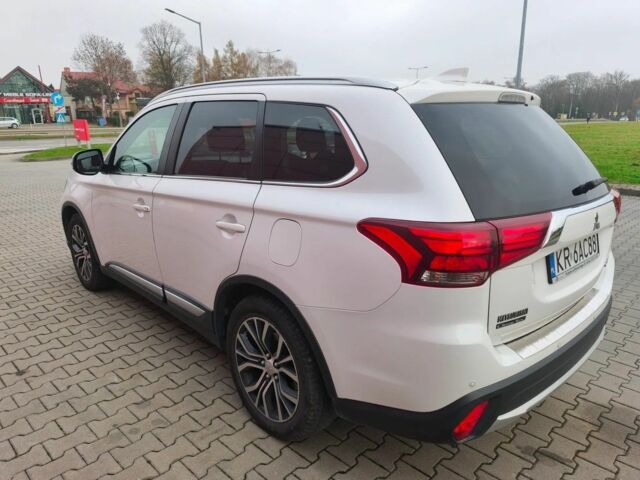 Белый Мицубиси Аутлендер, объемом двигателя 2 л и пробегом 135 тыс. км за 10200 $, фото 3 на Automoto.ua