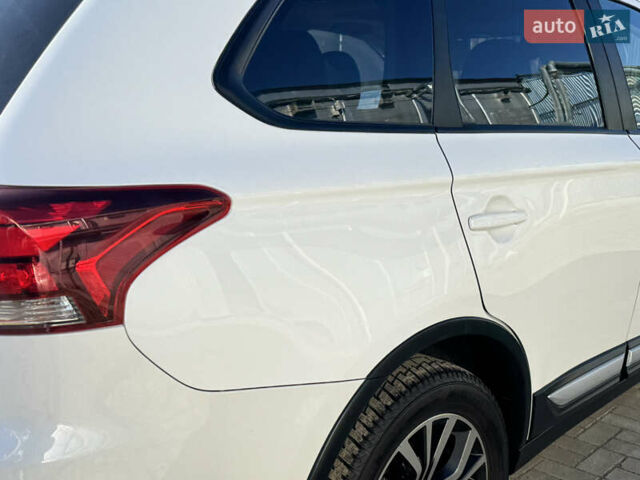 Білий Міцубісі Аутлендер, об'ємом двигуна 2.4 л та пробігом 178 тис. км за 12750 $, фото 31 на Automoto.ua