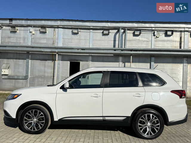 Білий Міцубісі Аутлендер, об'ємом двигуна 2.4 л та пробігом 178 тис. км за 12750 $, фото 5 на Automoto.ua