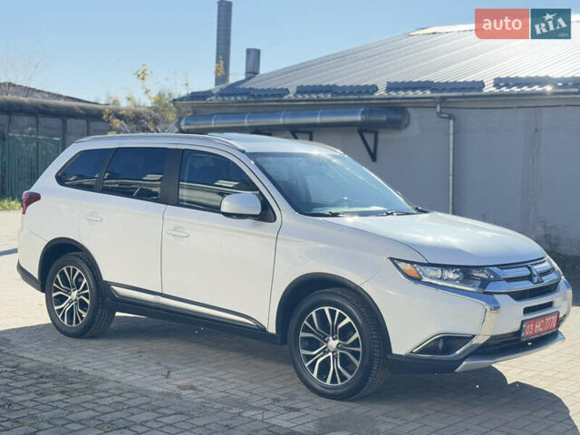Білий Міцубісі Аутлендер, об'ємом двигуна 2.4 л та пробігом 178 тис. км за 12750 $, фото 13 на Automoto.ua
