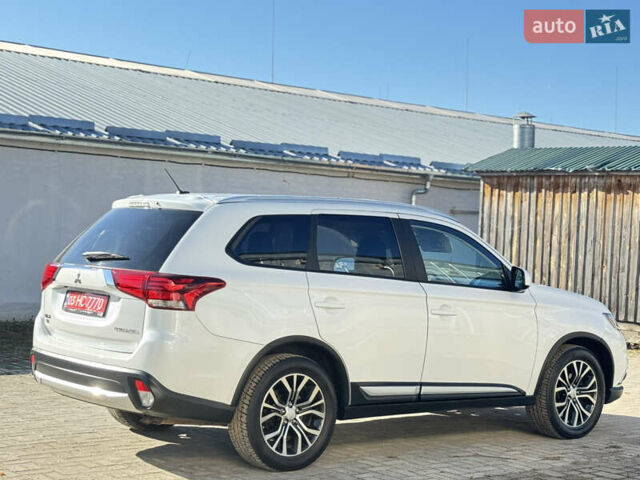 Білий Міцубісі Аутлендер, об'ємом двигуна 2.4 л та пробігом 178 тис. км за 12750 $, фото 10 на Automoto.ua