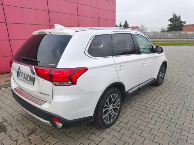 Белый Мицубиси Аутлендер, объемом двигателя 2 л и пробегом 135 тыс. км за 10200 $, фото 4 на Automoto.ua