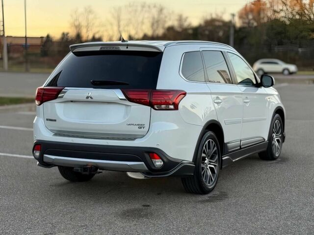 Белый Мицубиси Аутлендер, объемом двигателя 3 л и пробегом 78 тыс. км за 9900 $, фото 4 на Automoto.ua