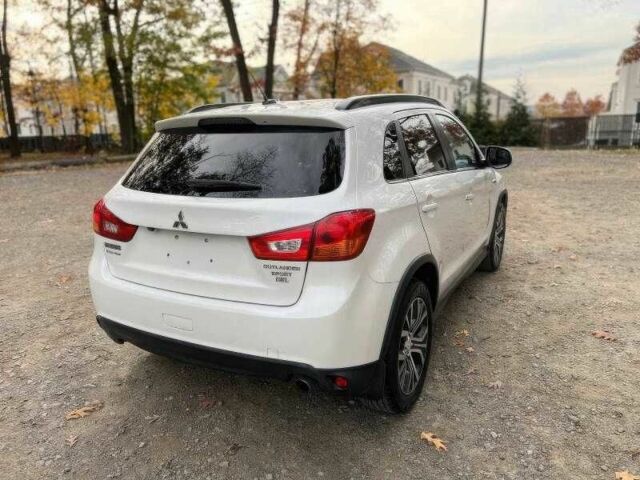 Білий Міцубісі Аутлендер, об'ємом двигуна 2.4 л та пробігом 98 тис. км за 4700 $, фото 6 на Automoto.ua