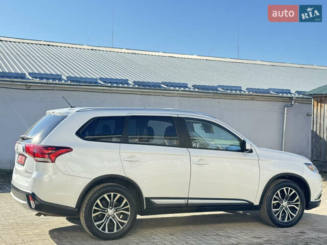 Білий Міцубісі Аутлендер, об'ємом двигуна 2.4 л та пробігом 178 тис. км за 12750 $, фото 11 на Automoto.ua