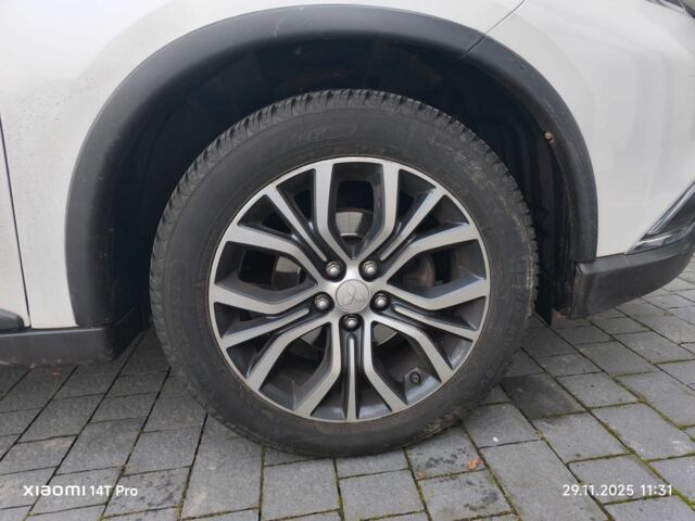 Белый Мицубиси Аутлендер, объемом двигателя 2 л и пробегом 135 тыс. км за 10200 $, фото 21 на Automoto.ua