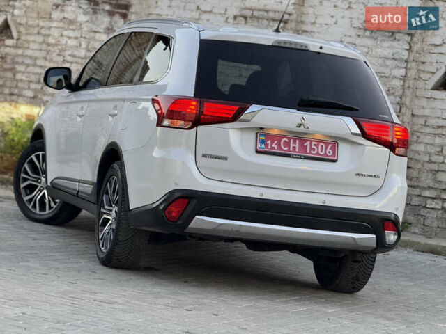 Білий Міцубісі Аутлендер, об'ємом двигуна 2.23 л та пробігом 215 тис. км за 17550 $, фото 34 на Automoto.ua