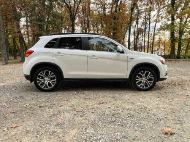 Білий Міцубісі Аутлендер, об'ємом двигуна 2.4 л та пробігом 98 тис. км за 4700 $, фото 5 на Automoto.ua