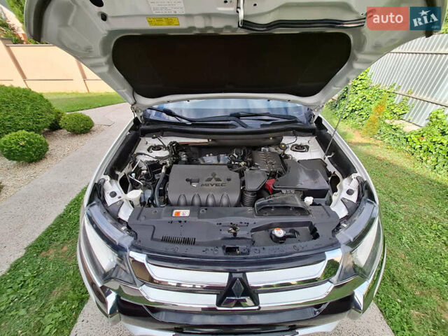 Белый Мицубиси Аутлендер, объемом двигателя 2.4 л и пробегом 145 тыс. км за 14900 $, фото 7 на Automoto.ua