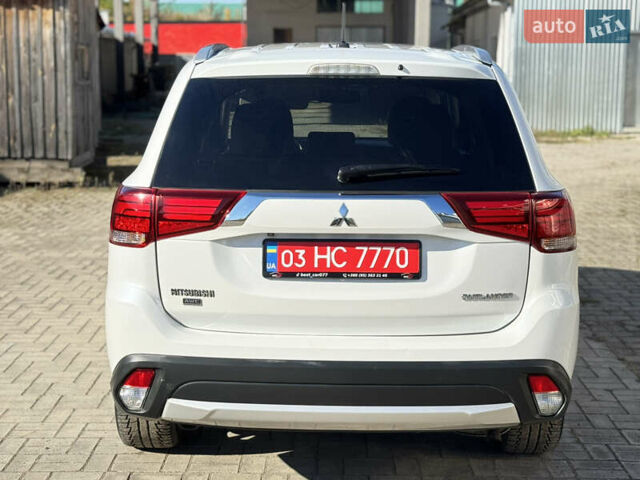 Білий Міцубісі Аутлендер, об'ємом двигуна 2.4 л та пробігом 178 тис. км за 12750 $, фото 8 на Automoto.ua