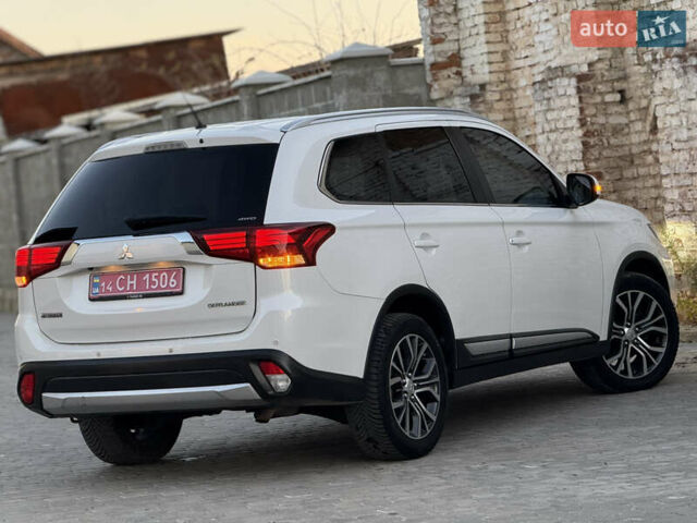 Білий Міцубісі Аутлендер, об'ємом двигуна 2.23 л та пробігом 215 тис. км за 17550 $, фото 20 на Automoto.ua