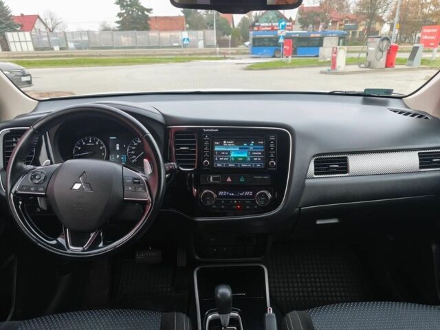 Белый Мицубиси Аутлендер, объемом двигателя 2 л и пробегом 135 тыс. км за 10200 $, фото 8 на Automoto.ua