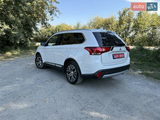Белый Мицубиси Аутлендер, объемом двигателя 2.2 л и пробегом 240 тыс. км за 17999 $, фото 56 на Automoto.ua
