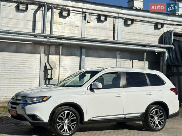 Білий Міцубісі Аутлендер, об'ємом двигуна 2.4 л та пробігом 178 тис. км за 12750 $, фото 4 на Automoto.ua