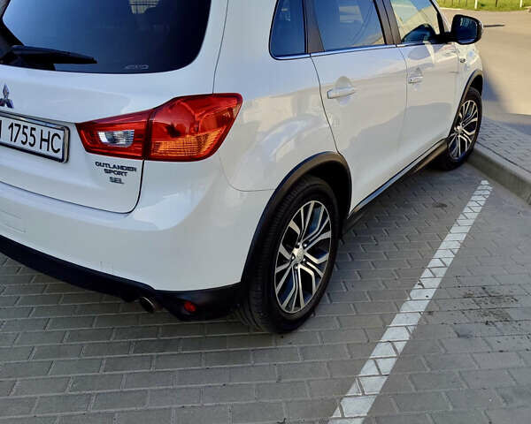 Білий Міцубісі Аутлендер, об'ємом двигуна 2.36 л та пробігом 133 тис. км за 13900 $, фото 2 на Automoto.ua