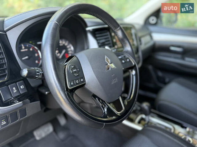 Белый Мицубиси Аутлендер, объемом двигателя 2.2 л и пробегом 240 тыс. км за 17999 $, фото 43 на Automoto.ua