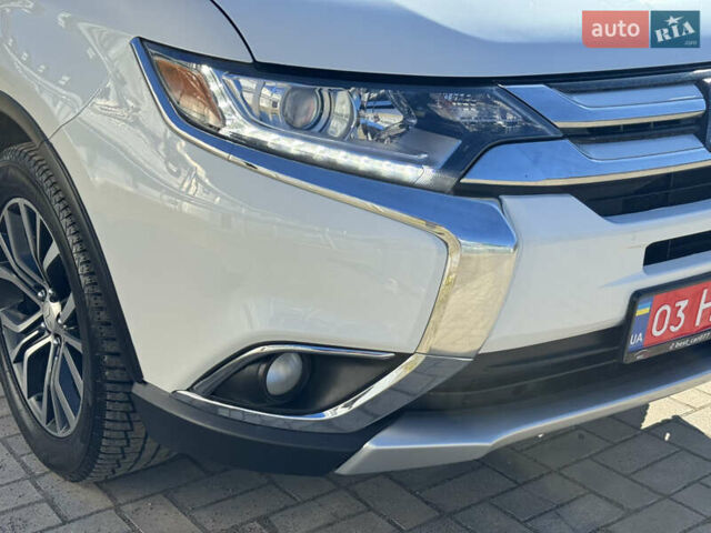 Білий Міцубісі Аутлендер, об'ємом двигуна 2.4 л та пробігом 178 тис. км за 12750 $, фото 16 на Automoto.ua