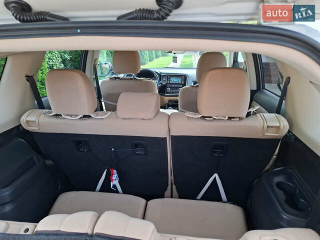 Белый Мицубиси Аутлендер, объемом двигателя 2.4 л и пробегом 145 тыс. км за 14900 $, фото 13 на Automoto.ua