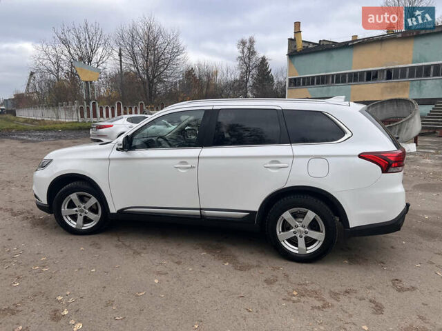 Білий Міцубісі Аутлендер, об'ємом двигуна 2.27 л та пробігом 145 тис. км за 18200 $, фото 7 на Automoto.ua