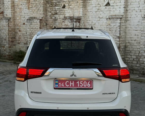 Білий Міцубісі Аутлендер, об'ємом двигуна 2.23 л та пробігом 215 тис. км за 17550 $, фото 27 на Automoto.ua