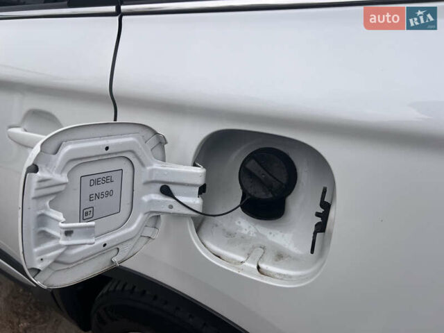Білий Міцубісі Аутлендер, об'ємом двигуна 2.27 л та пробігом 145 тис. км за 18200 $, фото 32 на Automoto.ua