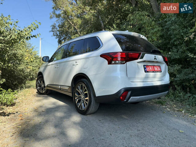 Белый Мицубиси Аутлендер, объемом двигателя 2.2 л и пробегом 240 тыс. км за 17999 $, фото 51 на Automoto.ua
