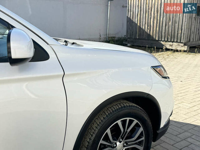 Білий Міцубісі Аутлендер, об'ємом двигуна 2.4 л та пробігом 178 тис. км за 12750 $, фото 34 на Automoto.ua
